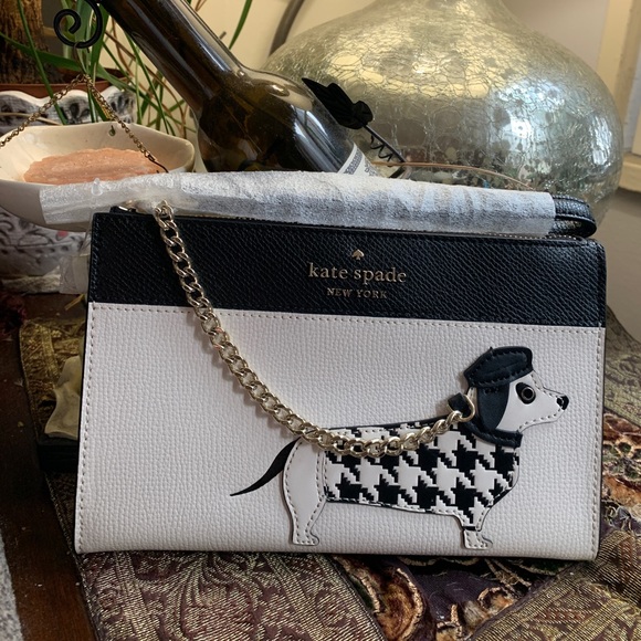 kate spade Handbags - Authentic Kate Spade leather Dog on leash top zip wristlet